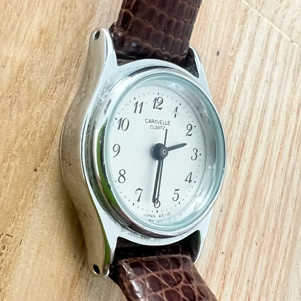 Caravelle by Bulova ladies silver tone brown leather dress watch NEW BATTERY